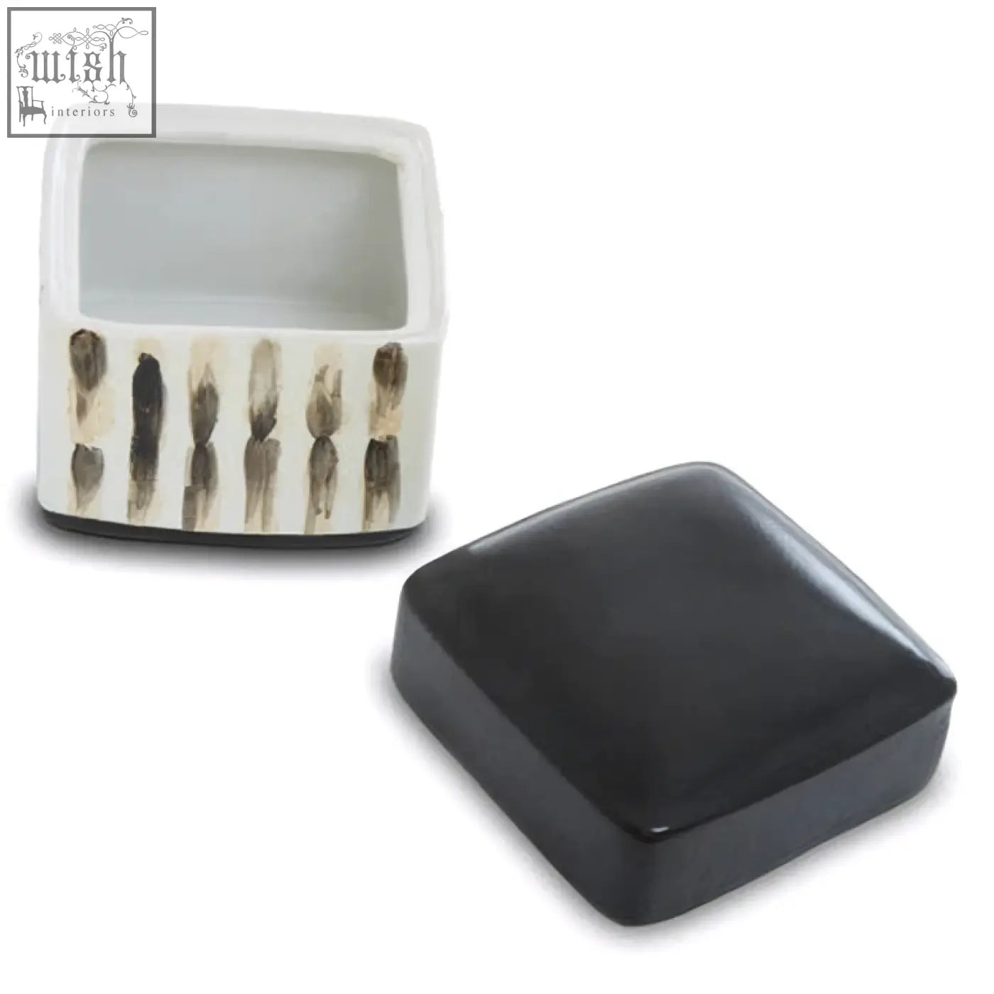 White ceramic mona brushstroke trinket box with black beige feather patterns and a glossy black lid