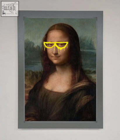 A mona lisa glasses framed print featuring the mona lisa wearing bright yellow dripping sunglasses
