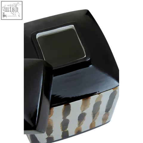 Black glossy Mona small ceramic jar with brown gray and white vertical brushstroke stripes on its sides