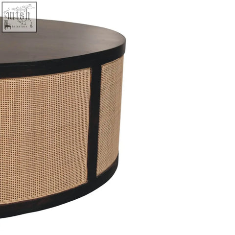 Black finished monaco round rattan coffee table with natural cane weave rattan panels and round rattan centerpiece design