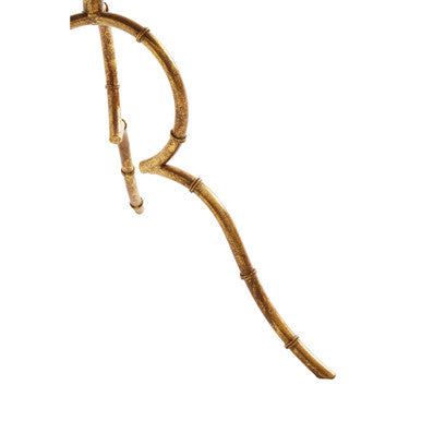Golden bamboo-style letter r necklace resting on monroe black tempered glass top accent table with sleek black frame