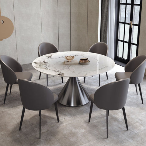 Modern round dining table with white marble top and stainless steel base paired with monroe dining chair