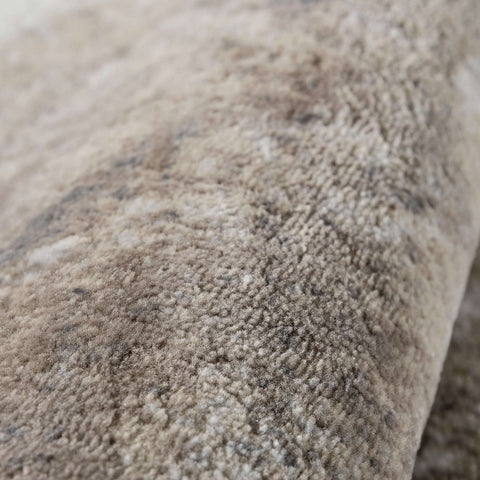 A plush soft fuzzy montana abstract brown rug in neutral beige and gray tones perfect as a cozy brown rug