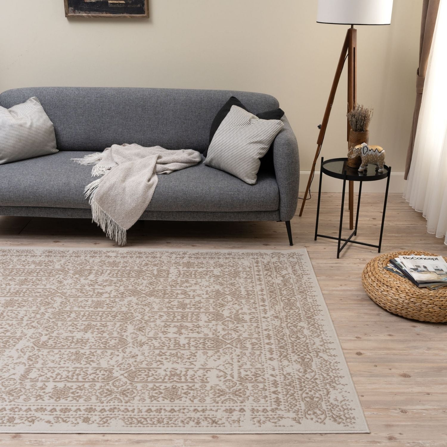Beige rug with intricate vintage-inspired pattern in neutral montana cream tones perfect for cozy living spaces
