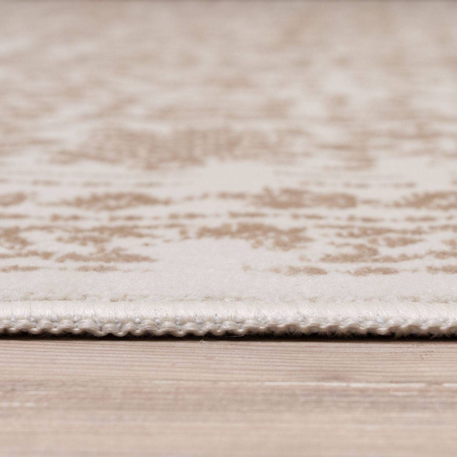 Beige rug montana cream with textured surface and woven border perfect for cozy living spaces