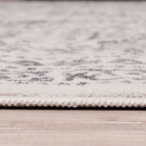 Montana cream rug with a subtle gray pattern and neatly stitched border perfect cream rug for cozy spaces