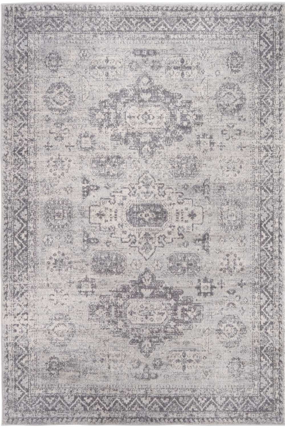 Gray and white montana vintage grey rug with intricate geometric and floral patterns in a vintage style area rug
