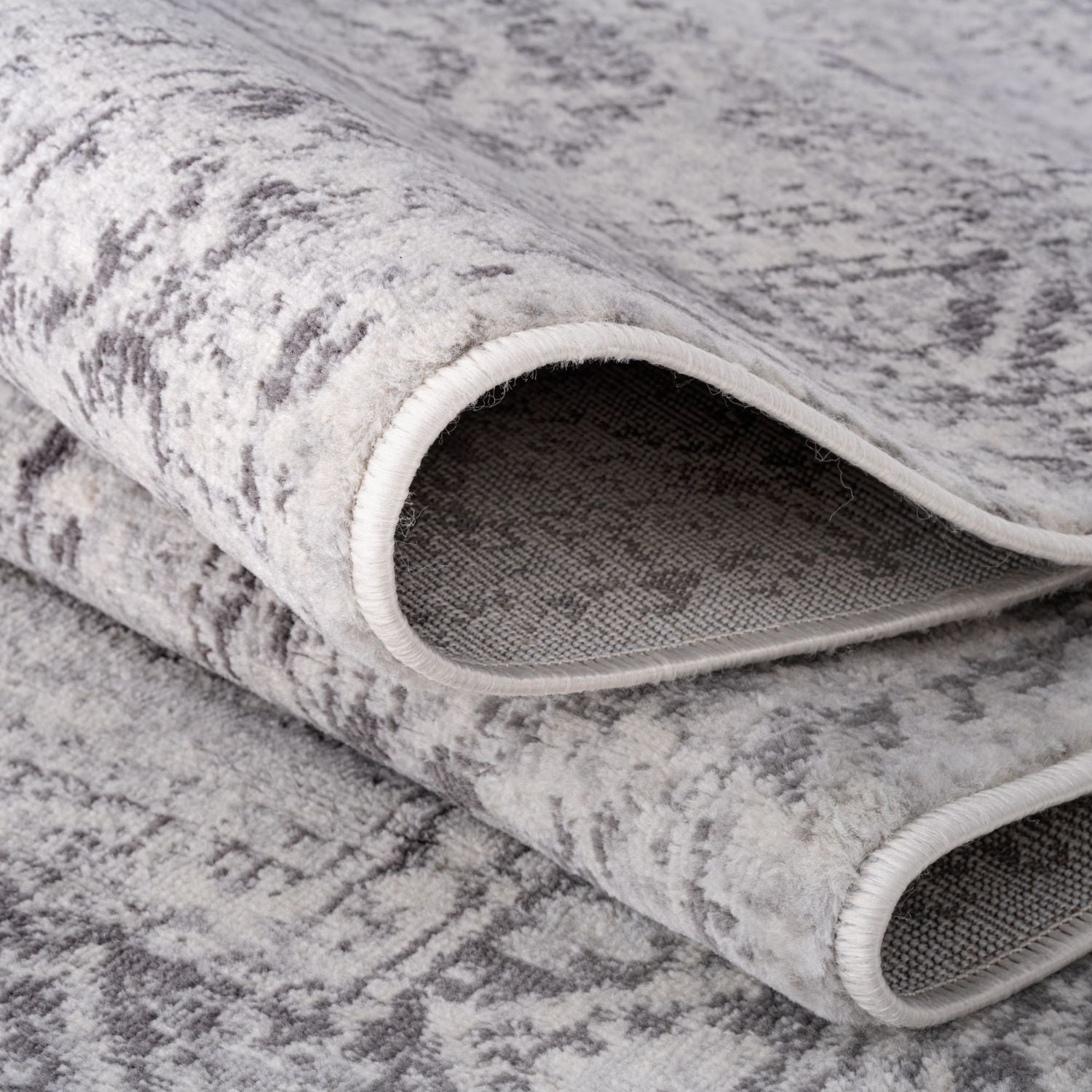 A soft textured grey rug with a subtle vintage pattern from montana vintage grey rugs collection 4050
