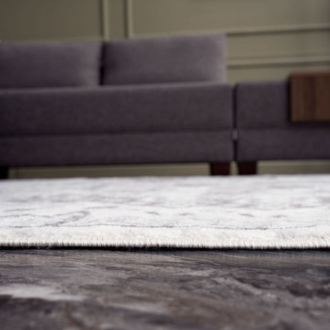 White shaggy area rug with subtle gray abstract patterns from montana vintage grey collection 4060