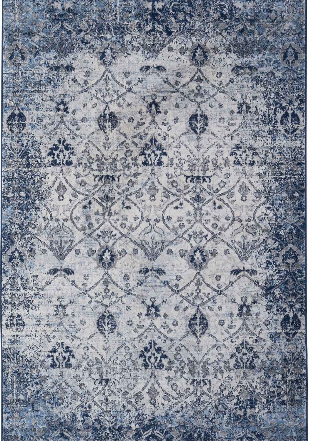 Montana vintage navy area rug with faded blue and gray damask pattern on a distressed textured surface