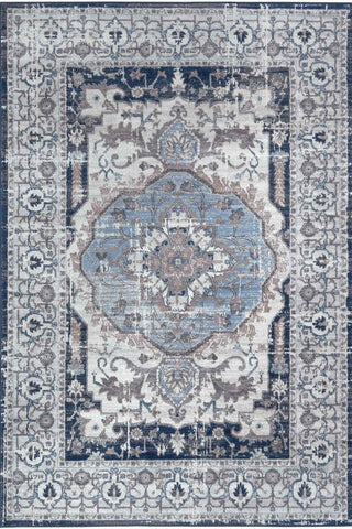 Vintage navy area rug with faded blue cream medallion and intricate navy gray beige borders in montana vintage style