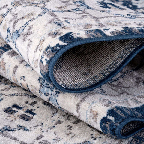 Blue and white montana vintage navy area rug with textured vintage-inspired pattern for cozy living spaces