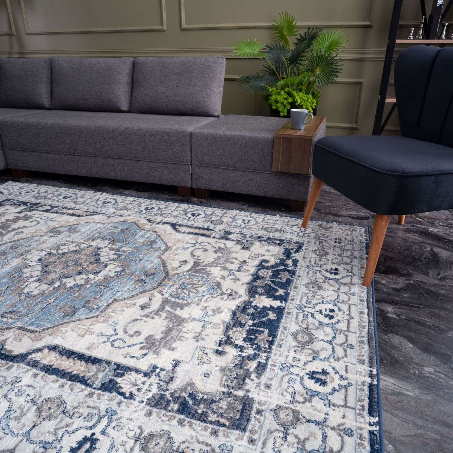 Montana vintage navy rug with faded blue and cream floral patterns in an antique vintage-style area rug design