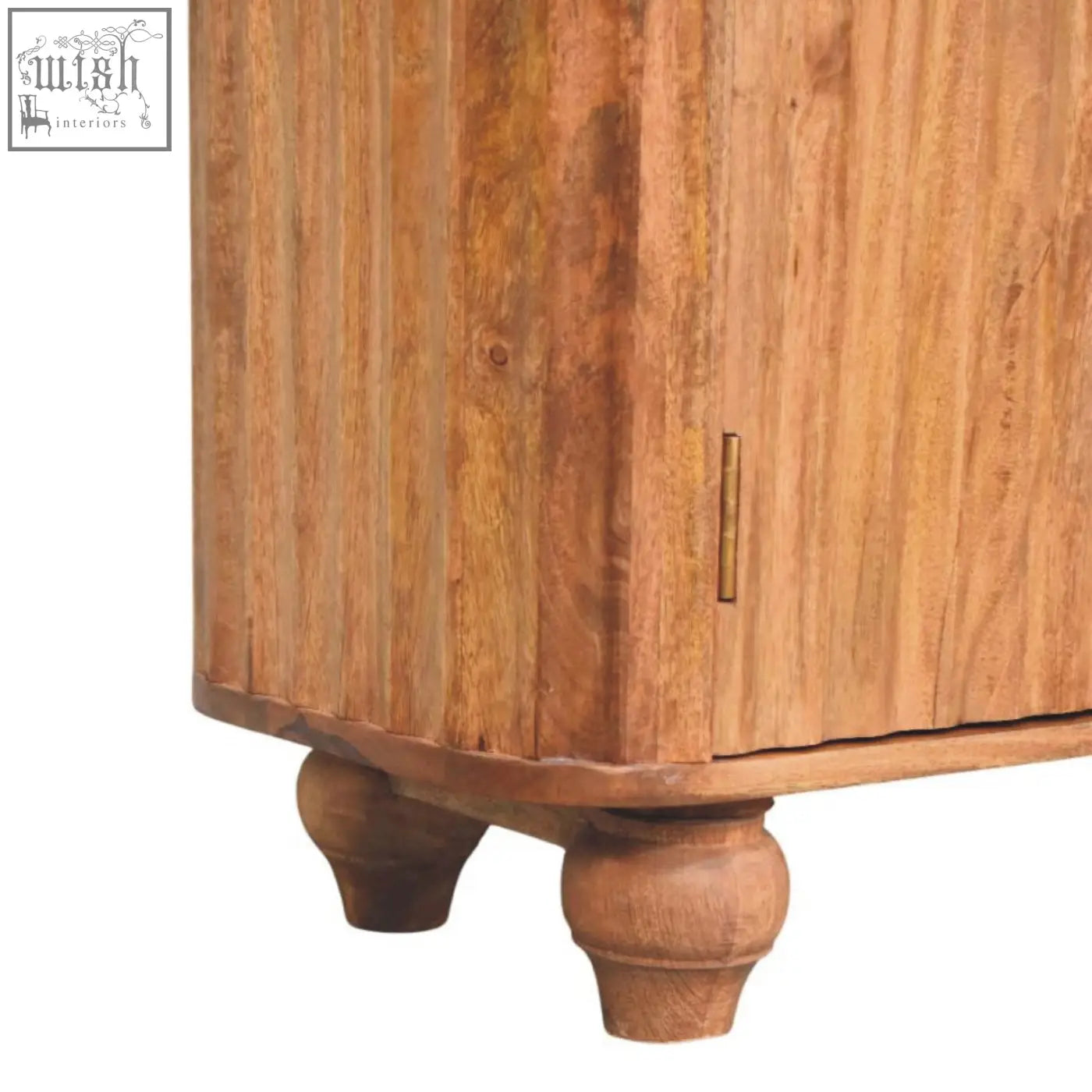 Montara sideboard chest of drawers made of solid mango wood with golden teak tone and rounded bun feet in warm amber tones
