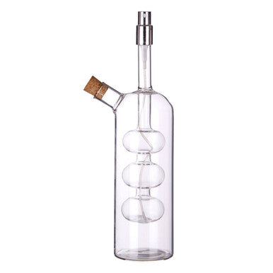 Montela oil and vinegar pourer with fine sprayer features clear glass and three stacked spherical chambers with a silver spout