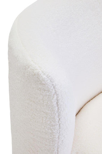 Montreal ivory boucle effect armless lounge chair showing white plush faux fur armrest with soft textured surface