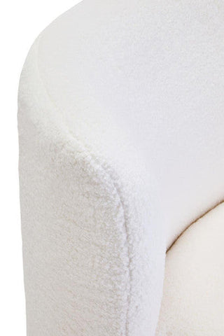 Montreal ivory boucle effect armless lounge chair showing white plush faux fur armrest with soft textured surface
