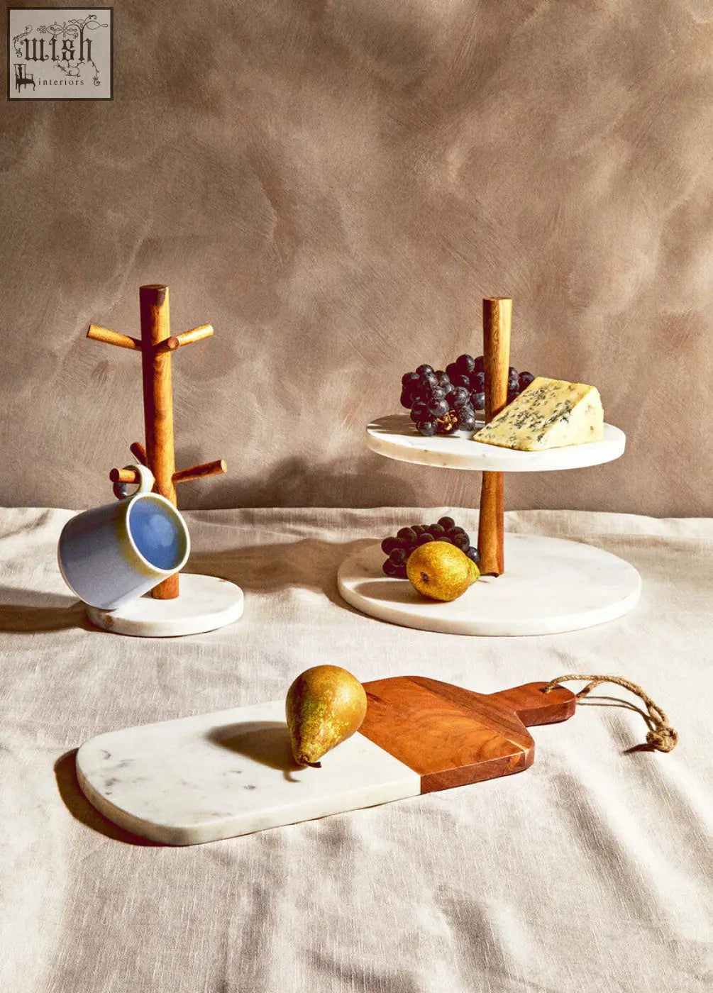 Monzaro two tier marble and acacia wood cake stand with white marble and natural grain wood cake stand finish