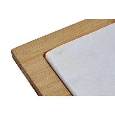 A monzaro cheese board with a white marble insert and a light bamboo wood frame for serving snacks