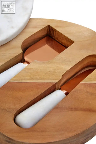 Wood cheese knife set with white marble handles on a wooden board perfect for serving cheese elegantly