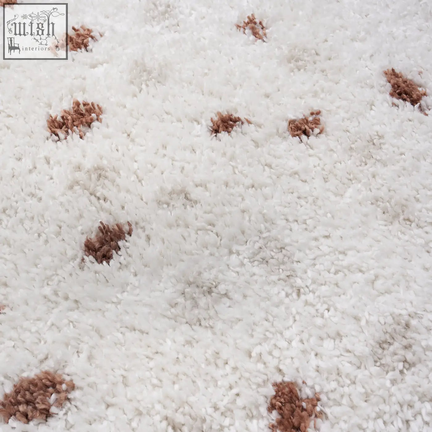 White plush moodi shaggy cream rug with scattered brown textured tufts shaggy cream terra design