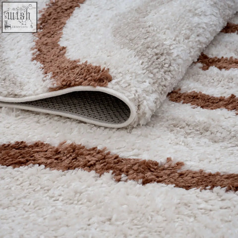 Moodi shaggy cream terra rug with plush cream and brown wavy stripes for cozy stylish home decor