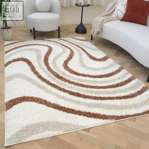 Moodi shaggy cream terra sunhaze rug with a cream and terracotta wavy-patterned shaggy texture perfect for cozy spaces