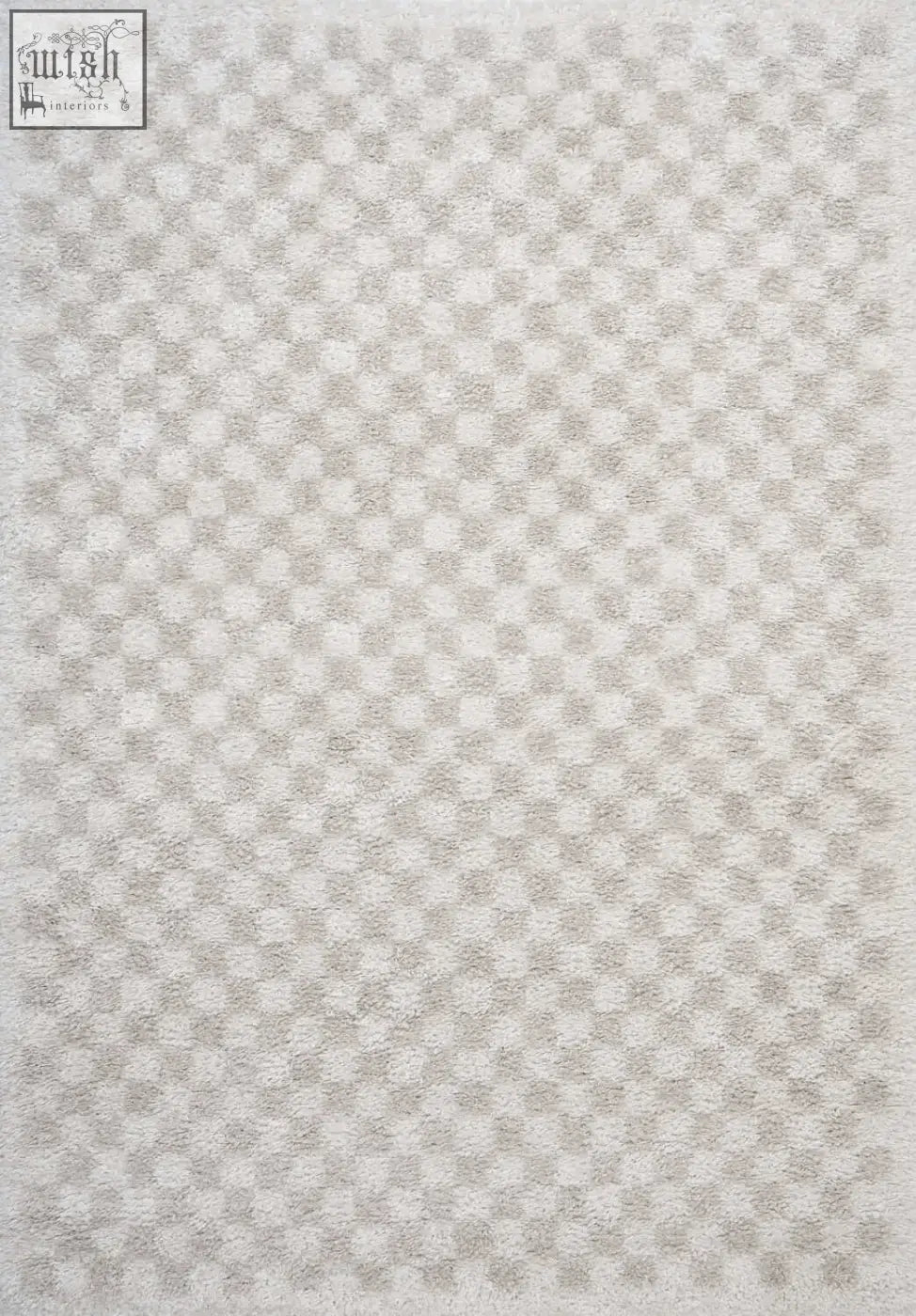 A plush moodi shaggy light beige nomari rug with a soft textured surface in light beige checkered pattern