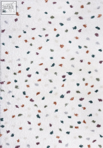White textured moodi shaggy multicolour rug with scattered green orange purple and gray leaf patterns multicolour jubile rug