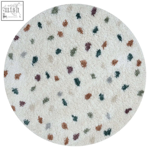 A plush off-white circular moodi shaggy multicolour jubile rug with soft texture and brown green gray speckles