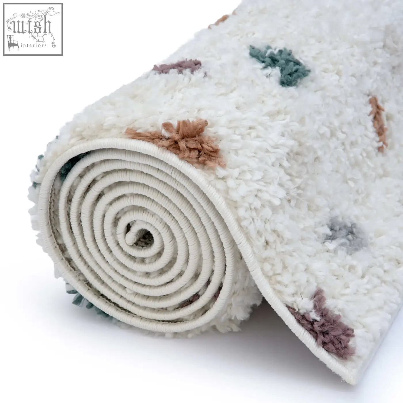 A plush off-white moodi shaggy multicolour jubile rug with soft textured tufts in dusty rose and sage green tones