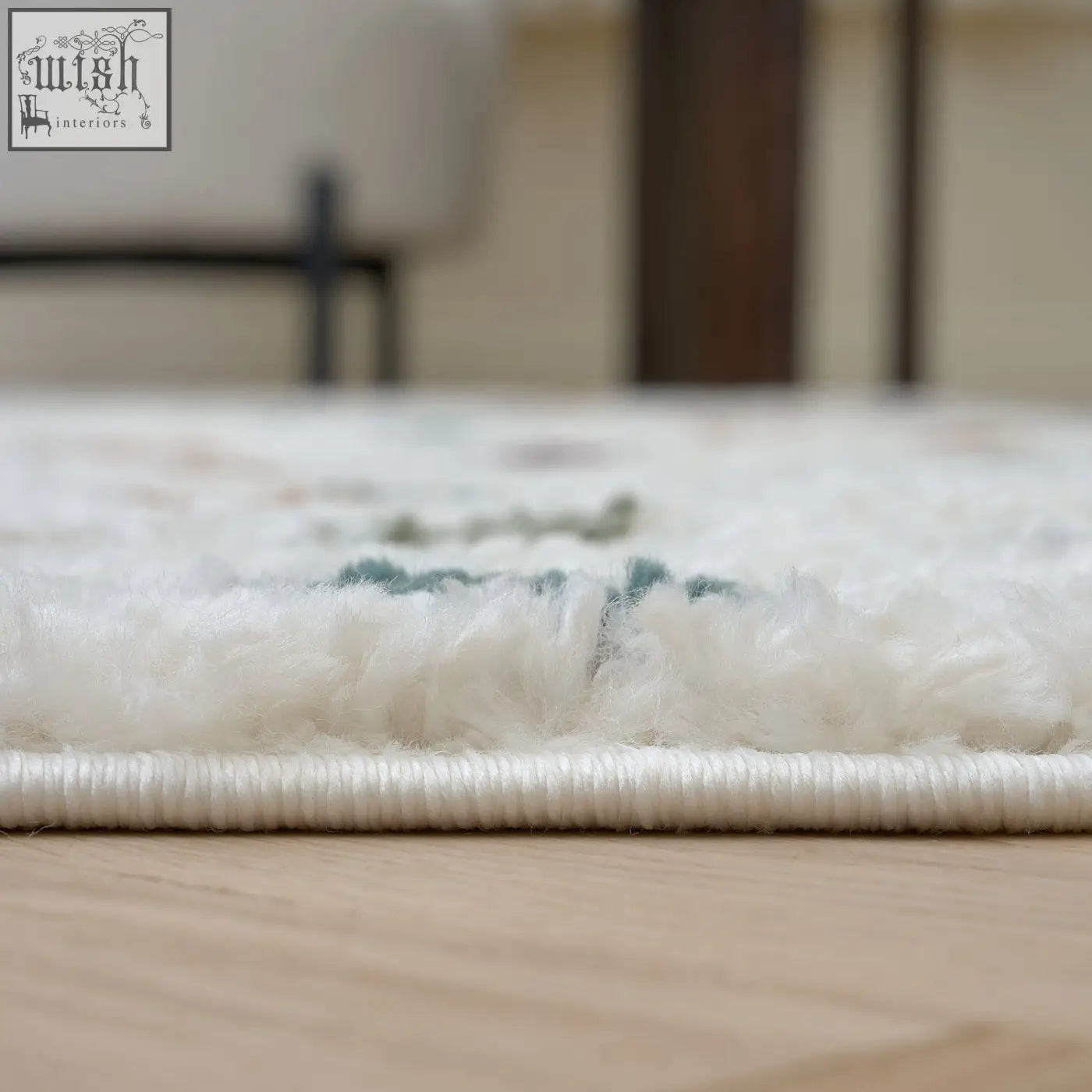 White shaggy moodi shaggy multicolour rug with soft fluffy texture and subtle gray geometric patterns near edge