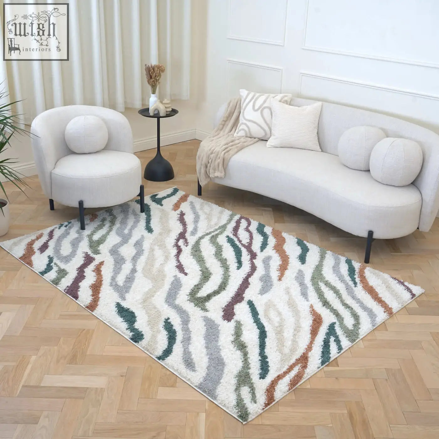 A rectangular moodi shaggy multicolour tidecrest rug with plush shaggy texture and abstract wavy earth tones design