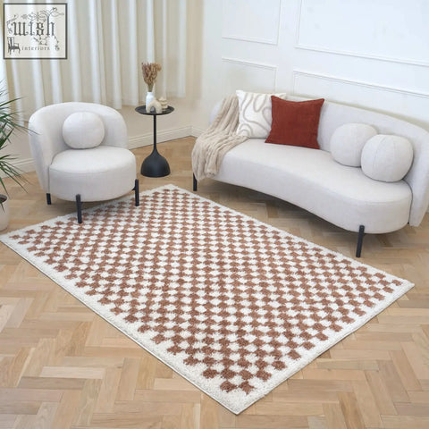 Creamy and terracotta checkered moodi shaggy terra rug with plush textured surface perfect for cozy spaces