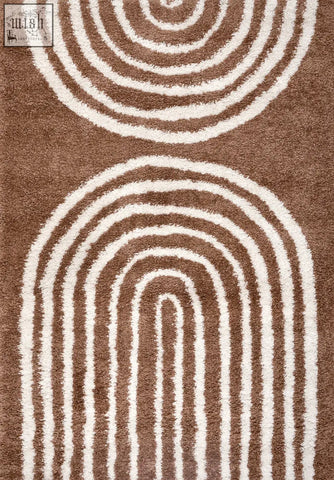 Brown and white concentric arc patterned plush bath mat in moodi shaggy terra tawny rug for cozy bathroom floors