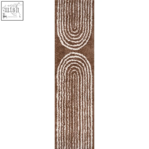 Brown and cream abstract patterned moodi shaggy terra shaggy terra tawny rug with concentric curved lines
