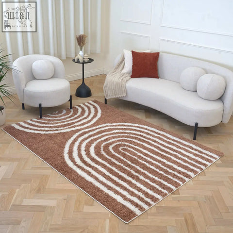 Brown and cream striped shaggy area rug with curved wave patterns moodi shaggy terra tawny rug