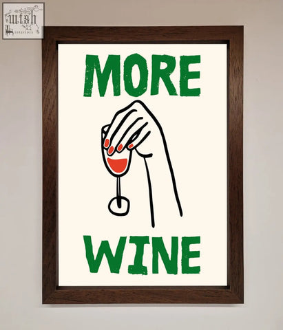 A more wine framed print with bold green text and a black hand holding a wine glass on off white background