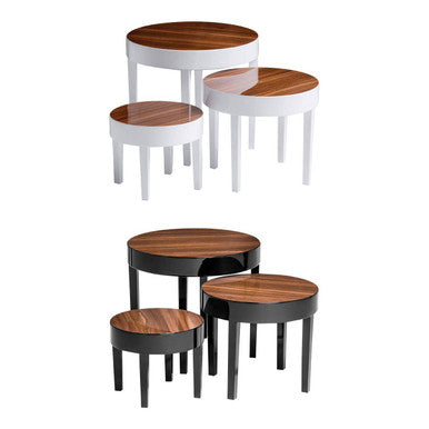Set of four moritz nest round tables with warm wood tops and white high gloss and black legs for versatile use