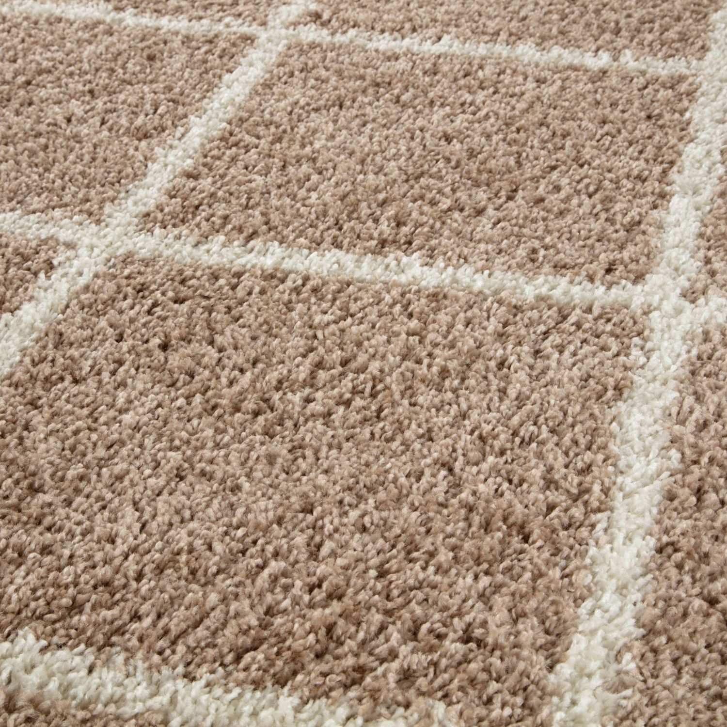 Moroccan beige shaggy rug with a beige and cream geometric pattern and soft plush texture perfect for cozy spaces