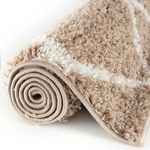 A plush moroccan beige shaggy rug with a soft textured surface perfect for cozy home decor