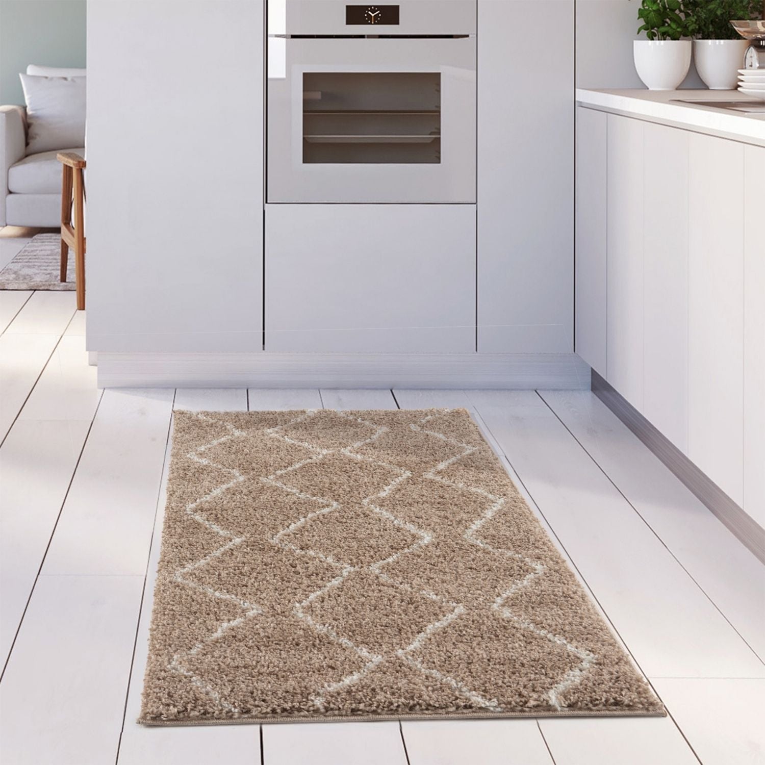 Moroccan beige shaggy rug featuring a cream geometric diamond pattern on a soft beige shaggy surface
