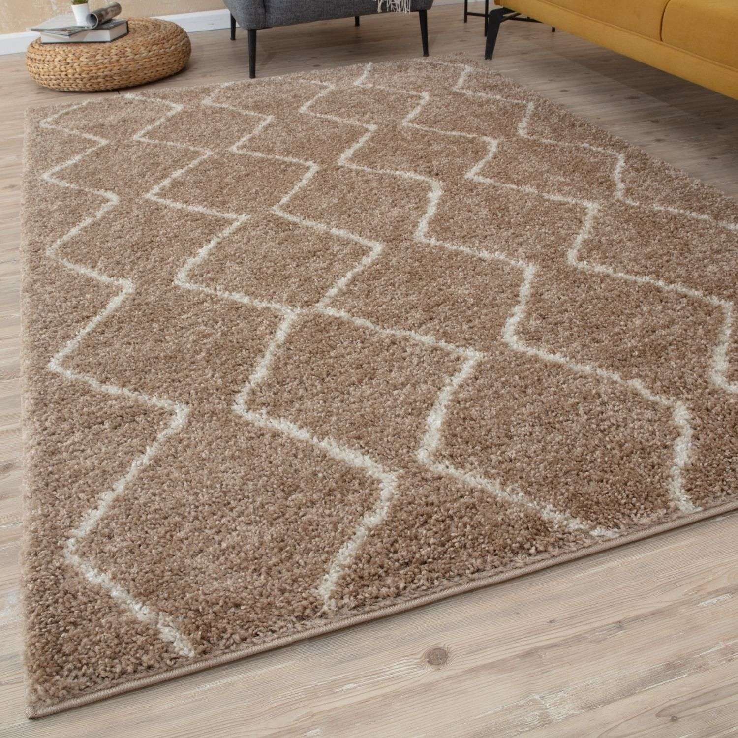 Moroccan beige shaggy rug with soft beige shaggy texture and cream geometric diamond pattern for cozy decor