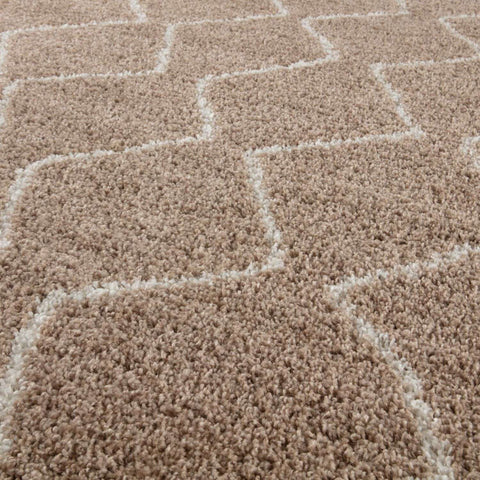 Moroccan beige shaggy rug with beige and cream geometric pattern and soft plush texture perfect for cozy spaces