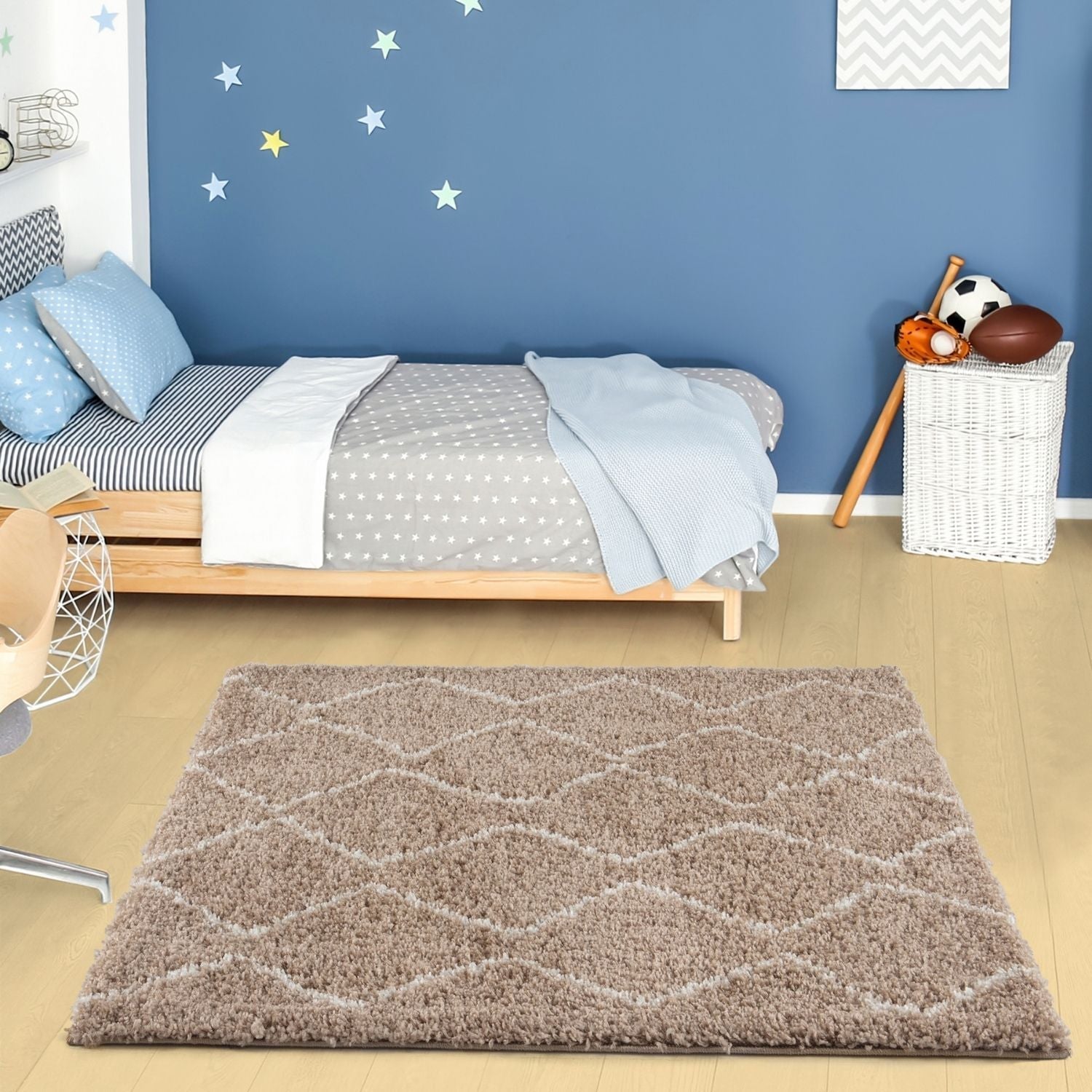A plush moroccan beige shaggy rug with soft texture and subtle geometric wave pattern in taupe beige tones