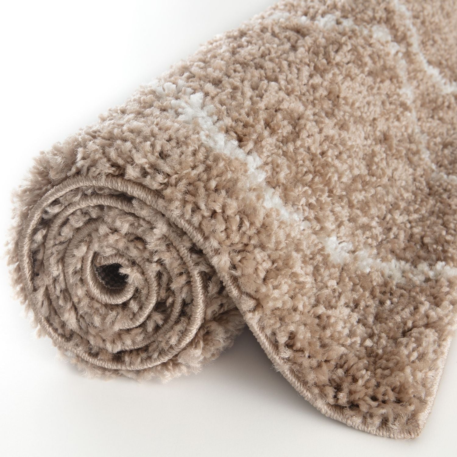 A moroccan beige shaggy rug with plush beige and white stripes and a soft shaggy texture perfect for cozy spaces