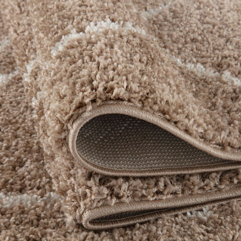 Moroccan beige shaggy rug with soft plush texture and subtle white geometric pattern in beige shaggy rug style