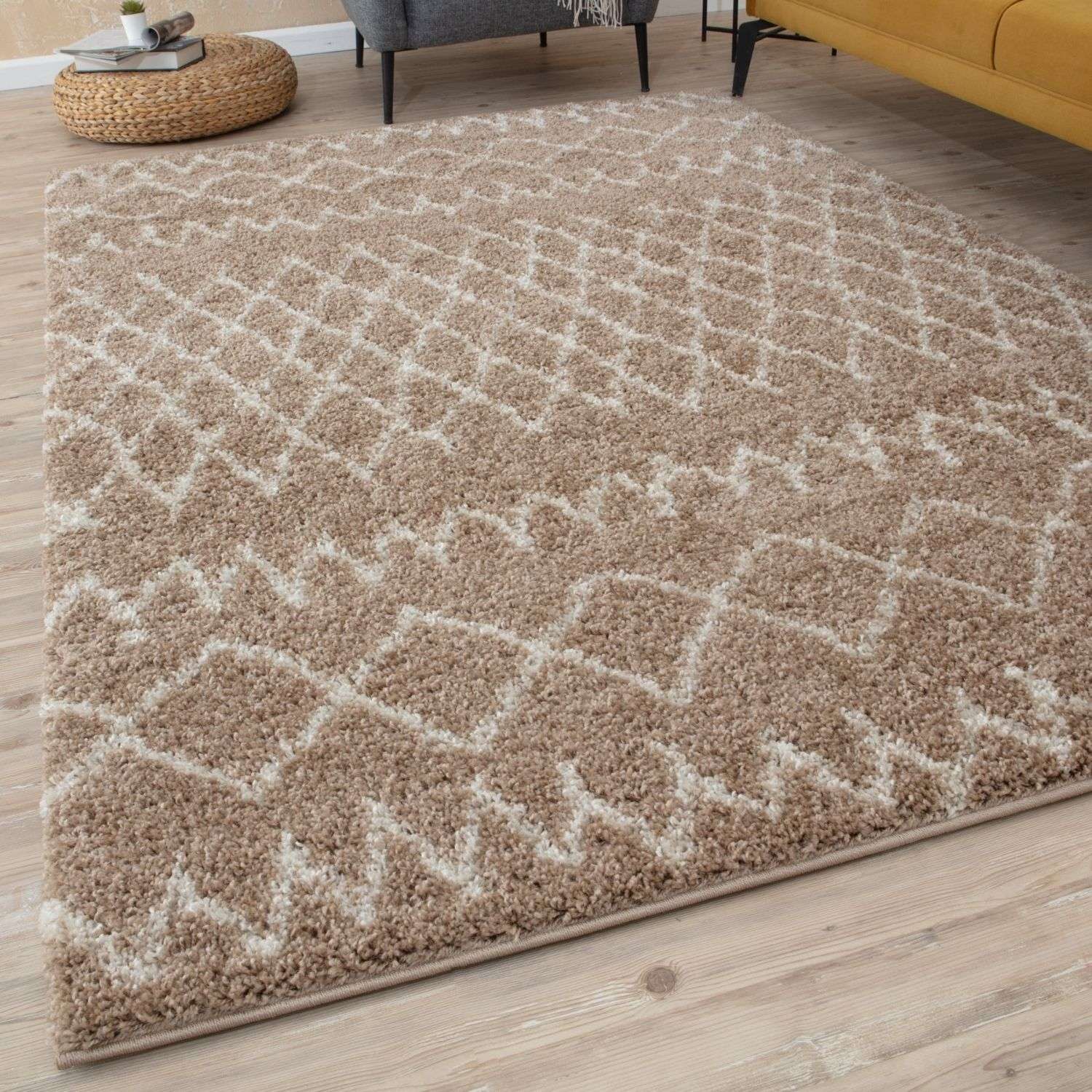 Moroccan beige shaggy rug with plush textured surface and beige cream geometric pattern for cozy decor
