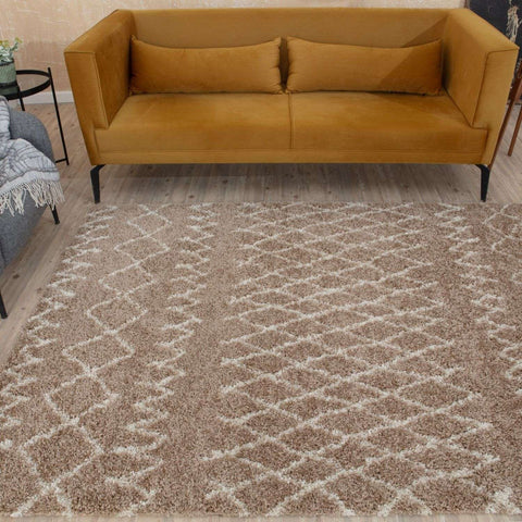A plush moroccan beige shaggy rug with a beige and cream geometric pattern perfect for cozy spaces