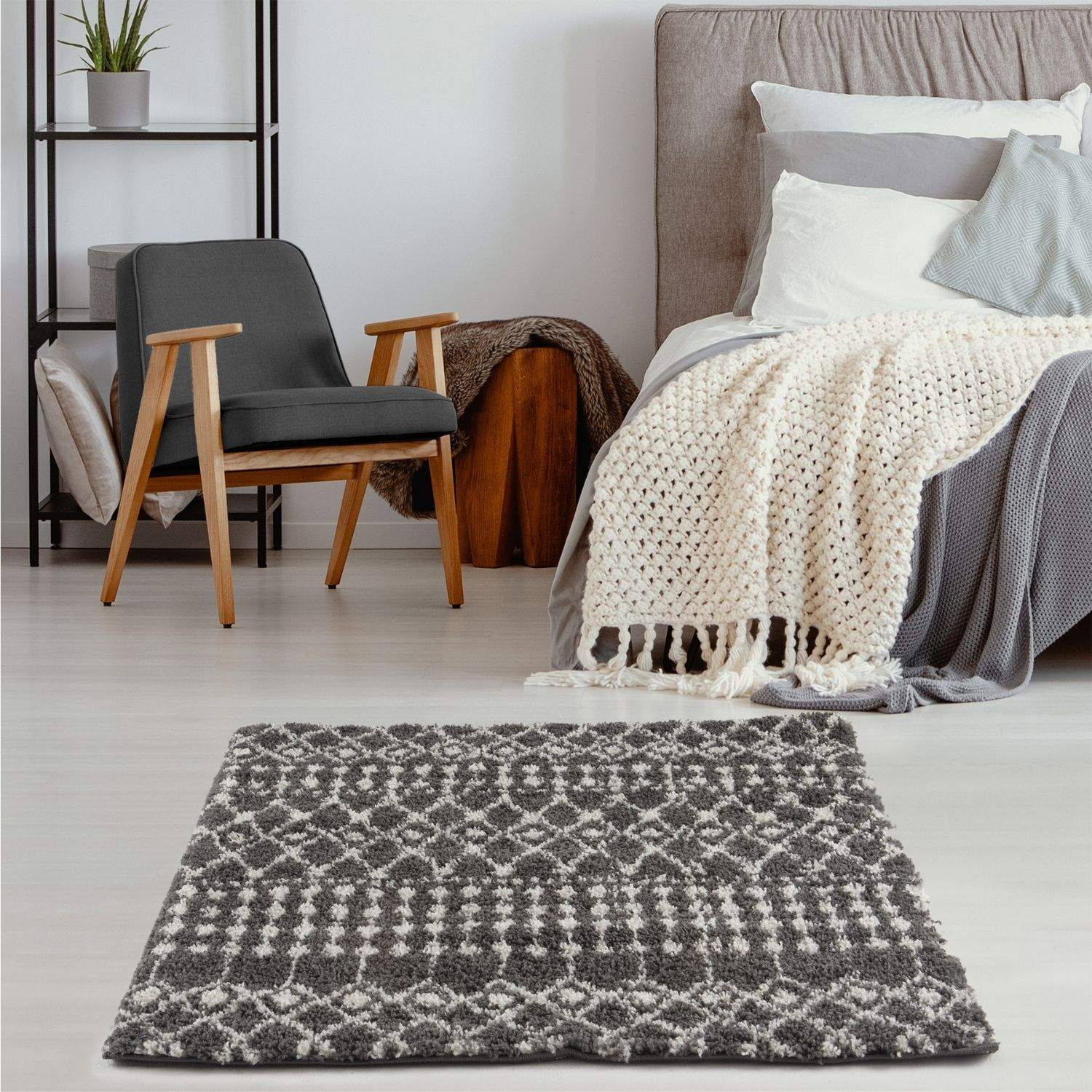 Gray and white geometric patterned moroccan dark grey shaggy rug with a soft plush texture perfect for living rooms